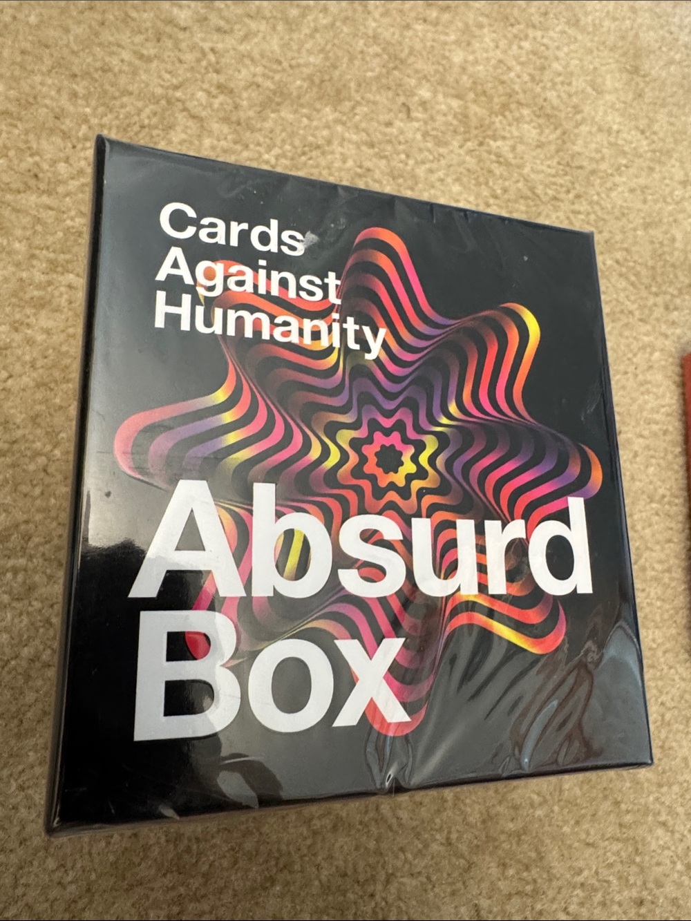 Cards Against Humanity Absurd Box - Black with Multicolor Design